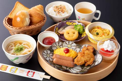 a tray of food with different types of food at Onyado Shikishima-kan in Kotohira