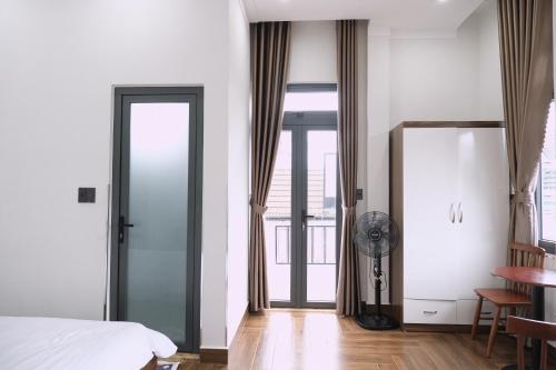 Ein Bett oder Betten in einem Zimmer der Unterkunft I'm Home in Dalat