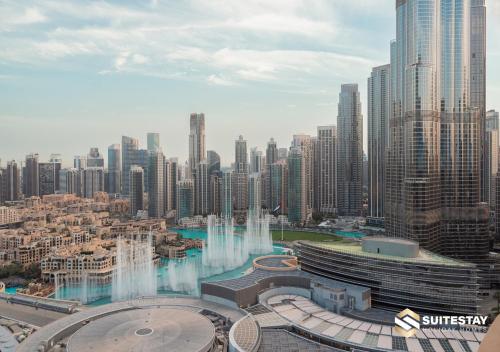 a view of a large city with a fountain at Fashion Avenue Dubai Mall in Dubai
