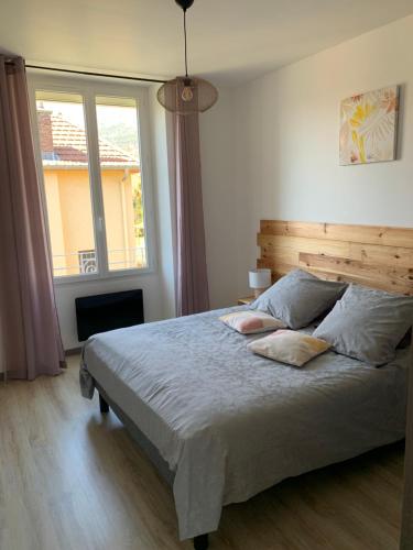 Llit o llits en una habitació de Les LILAS