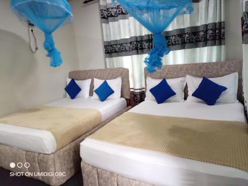 Ένα ή περισσότερα κρεβάτια σε δωμάτιο στο Summer Villa