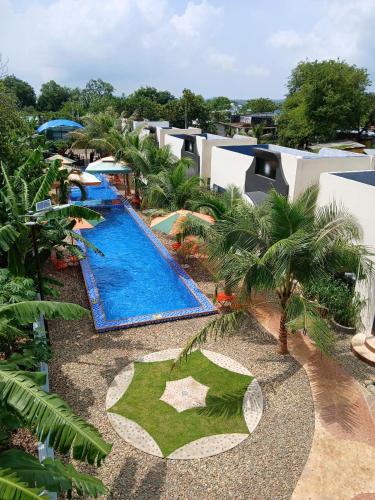 an aerial view of a resort with a swimming pool at paparazzi homestay in Xuyên Mộc