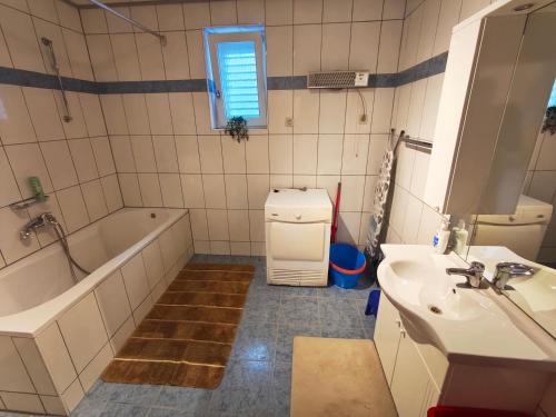 Koupelna v ubytování Apartments Rafael