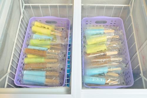 two drawers filled with different colored pens in a refrigerator at Sanco Inn Tsu Ekimae in Tsu