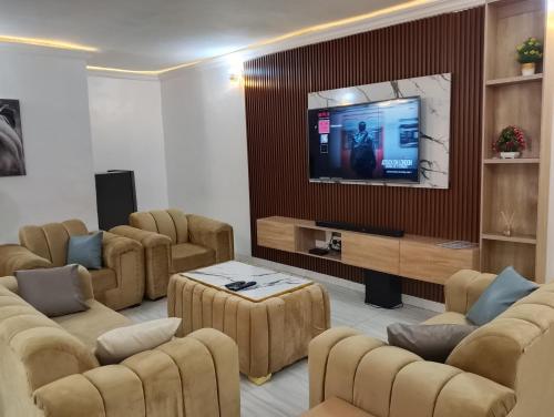 TV a/nebo společenská místnost v ubytování Memento Courts