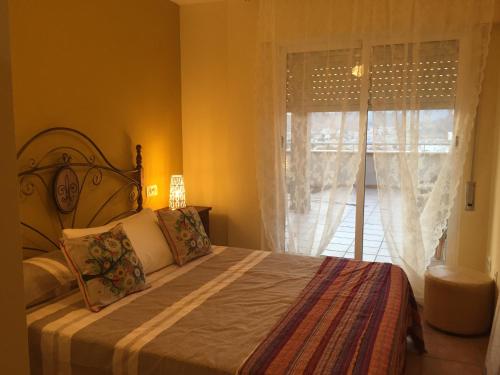 Postel nebo postele na pokoji v ubytování Apartamento Rivas