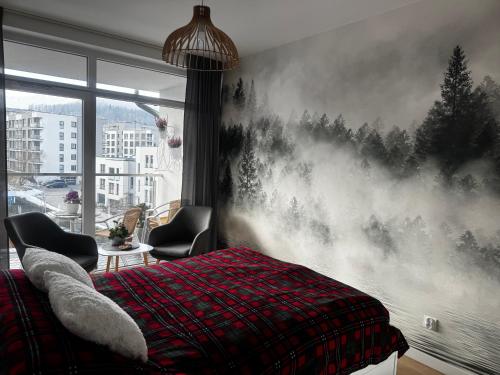 Katil atau katil-katil dalam bilik di Apartamenty pod Dębowcem Apartament 44 Rowerek