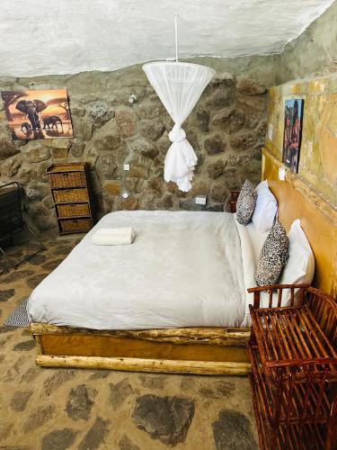 Katil atau katil-katil dalam bilik di Fichstone cave house 1bedroom