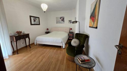Ένα ή περισσότερα κρεβάτια σε δωμάτιο στο Home Away From Home