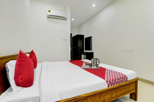 Postel nebo postele na pokoji v ubytování Hotel O S D Palace