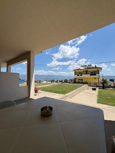 a view of a building from the balcony of a house at Vila Vavilon in Star Dojran