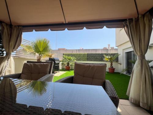 Posezení v ubytování Piso con terraza a 5 min del mar