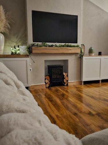 TV a/nebo společenská místnost v ubytování Northenden Village