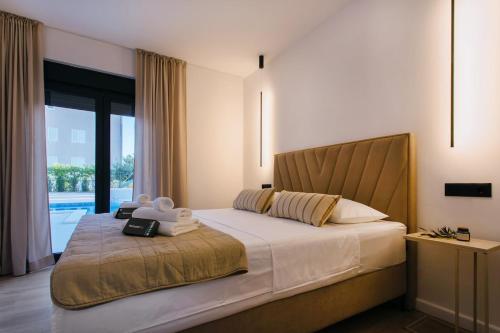 En eller flere senge i et værelse på Luxury apartment KaLeGa