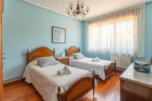 Ένα ή περισσότερα κρεβάτια σε δωμάτιο στο villa escalante