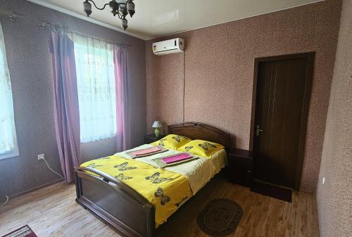Llit o llits en una habitació de Guesthouse Gegi