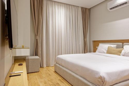 Postel nebo postele na pokoji v ubytování VESTA - Cairo Residence