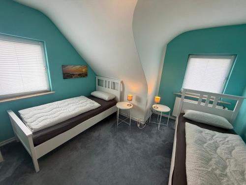 Ένα ή περισσότερα κρεβάτια σε δωμάτιο στο Wohnung in Troisdorf T06