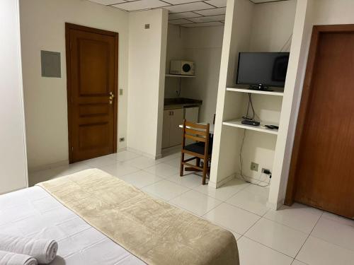 TV a/nebo společenská místnost v ubytování Maktub Hotel Itu