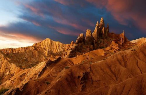 a view of a mountain in the desert at Yurt Camp Town of heavenly mountains " Kyz Zhibek" in Dzhetyoguz