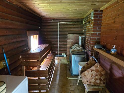 an inside view of a room with wooden walls at Merikarviantupa1 in Pori