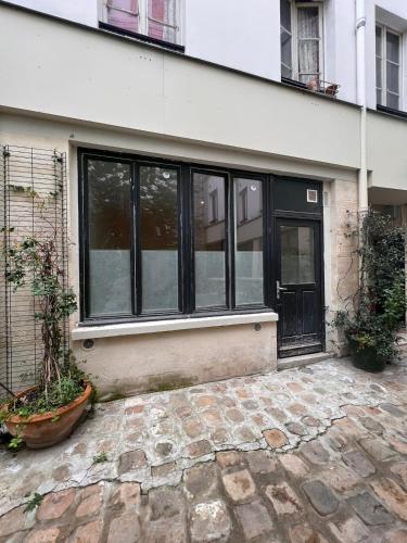 Studio lumineux sur cour à Bastille