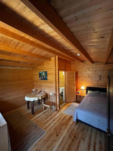 Llit o llits en una habitació de Atpūtas vieta “Ratuļi”