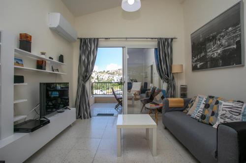 Foto The Marilouize Apartment 6