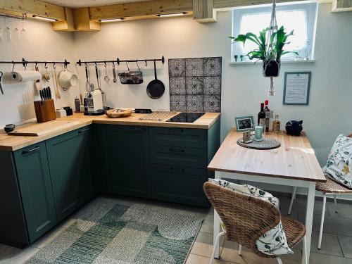 Kuchyň nebo kuchyňský kout v ubytování Minicottage Casa de Lipa