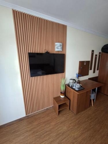 Μια τηλεόραση ή/και κέντρο ψυχαγωγίας στο Guest House Skalite