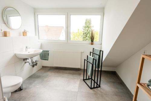 Ένα μπάνιο στο Dachidylle, stylish apartment with feel-good factor