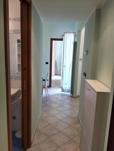 a room with a bathroom with a sink and a toilet at La Casetta in Riva Ligure