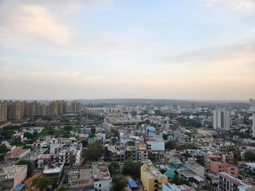 an aerial view of a city with tall buildings at LuxePink Teddd Jucuzzi Studio-PrivatePatio in Gurgaon