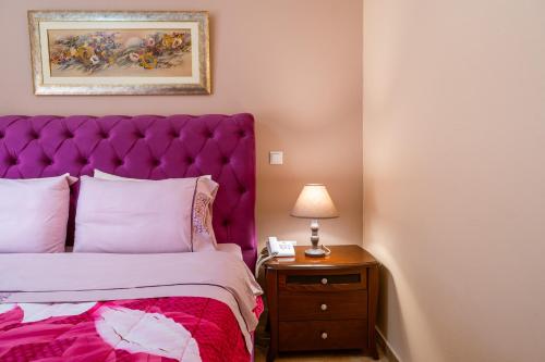 Postel nebo postele na pokoji v ubytování Hotel Eirini