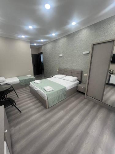 SkyHouse Batumiにあるベッド