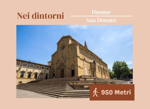 an old church with steps in front of a building at 3 Min dalla Stazione e free parking - Centro Città in Arezzo