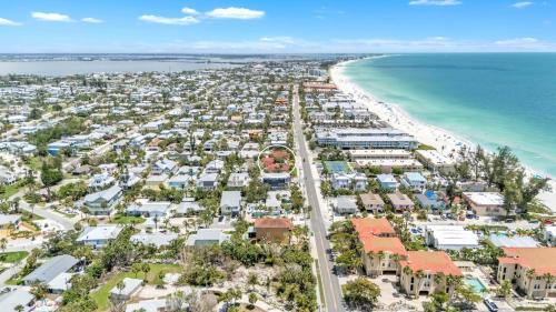 an aerial view of a beach with houses and the ocean at The Villas 2B in Holmes Beach
