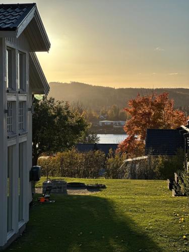a view of a yard with a house at Island Villa in Sundsvall Alnö in Alnön