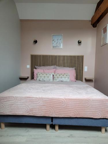 Llit o llits en una habitació de L'oustal de Léon