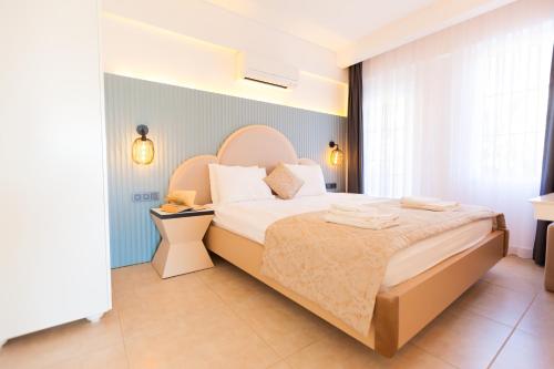 Ένα ή περισσότερα κρεβάτια σε δωμάτιο στο Kalkan Suite 201