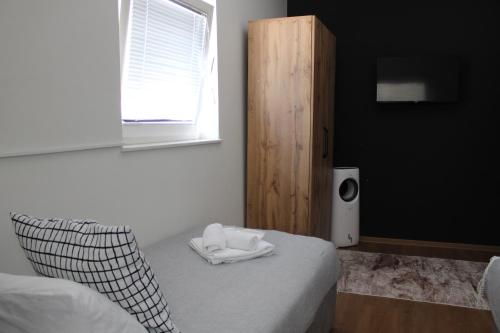 Šeherezada Roomsにあるベッド