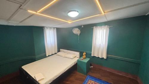 Postel nebo postele na pokoji v ubytování Emon's Corner