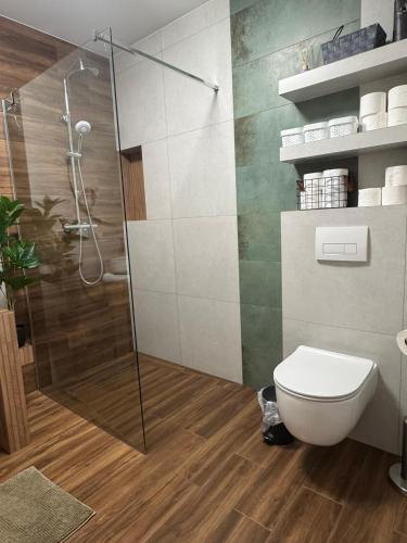 Un baño de JW Apartments
