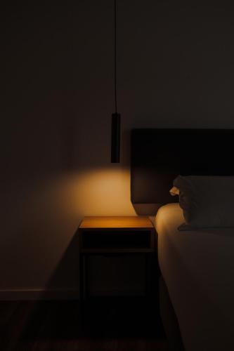 Ένα ή περισσότερα κρεβάτια σε δωμάτιο στο Monte Prado Hotel & Spa