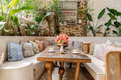 a living room with a couch and a table at Mediha Hanım Konağı Alaçatı in Cesme