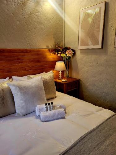 Cama o camas de una habitación en Sandstone Escape Guesthouse