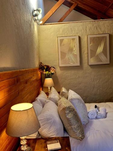 Cama o camas de una habitación en Sandstone Escape Guesthouse