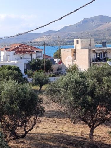 a view of a village with trees and buildings at Niko's apartments 1 in Elafonisos