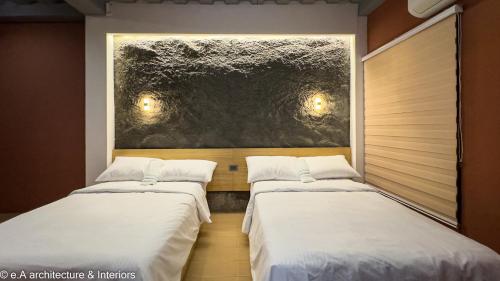 Ein Bett oder Betten in einem Zimmer der Unterkunft Eunice Villa and Cabins