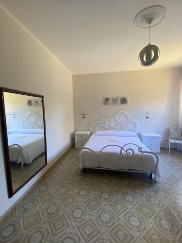 Кровать или кровати в номере A casa di Rita